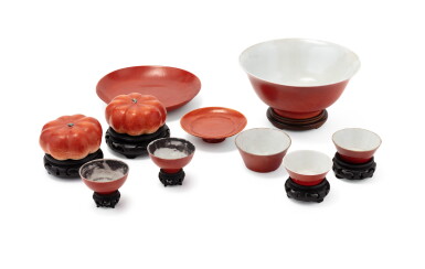 View full screen - View 1 of Lot 172. A group of ten coral-ground enamelled porcelains Qing dynasty, 18th-19th century | 清十八至十九世紀 紅釉瓷器一組十件.