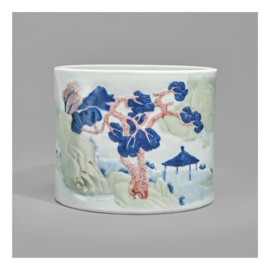 View full screen - View 1 of Lot 125. AN UNDERGLAZE-BLUE, COPPER-RED, AND CELADON-GLAZED 'LANDSCAPE' BRUSHPOT, KANGXI MARK AND PERIOD.