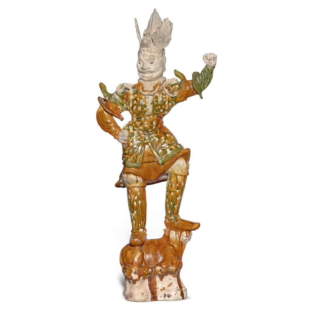 View full screen - View 1 of Lot 698. A large sancai-glazed pottery figure of a Lokapala, Tang dynasty | 唐 三彩天王立像.