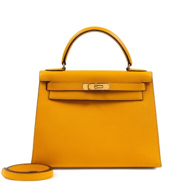 View full screen - View 1 of Lot 650. Vintage Jaune Ambre Courchevel Kelly 28 Sellier Gold Hardware, circa 1990s.