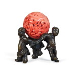 A carved coral 'dragons' bead, Qing dynasty, 18th century, with a gilt-decorated bronze 'boys' stand, Late Ming dynasty | 清十八世紀 珊瑚雕龍紋珠 配 明末 局部鎏金銅童子座