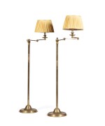 A pair of gilt-brass articulated floor lamps, modern, with pleated silk lampshades by studio Peregalli | Paire de lampadaires articulés en laiton doré, travail moderne, les abats jours en soie plisée par le studio Peregalli