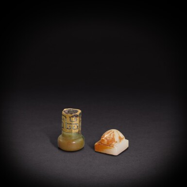 View full screen - View 1 of Lot 7870. A jade-inset and gold-overlaid finial and a white jade 'beast' seal, Han dynasty | 漢 嵌玉鑲金端飾及白玉獸鈕印.