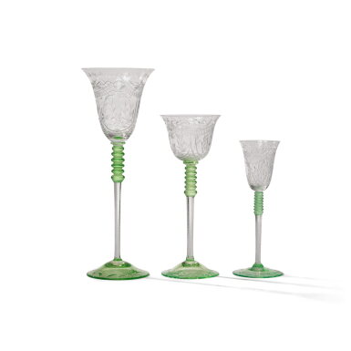 View full screen - View 1 of Lot 53. A Bohemian Green-Tinted and Engraved Glass Table Service, Early 20th Century.