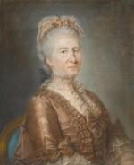 Portrait of a woman, seated, wearing a copper coloured dress adorned with lace