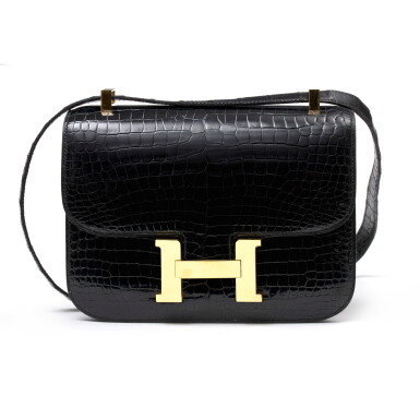 View full screen - View 1 of Lot 1048. Noir Shiny Crocodile Porosus Constance 24 Gold Hardware, 1996 .
