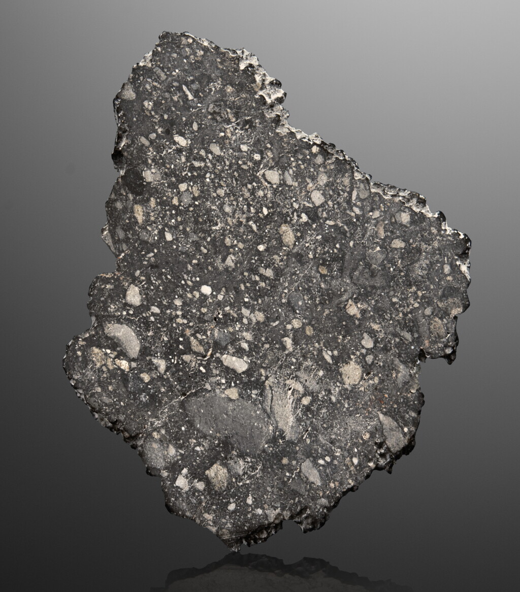View full screen - View 1 of Lot 122. Lunar Meteorite | Complete Slice Of The NWA 8306 Lunar Breccia — Among The Rarest Substances On Earth.