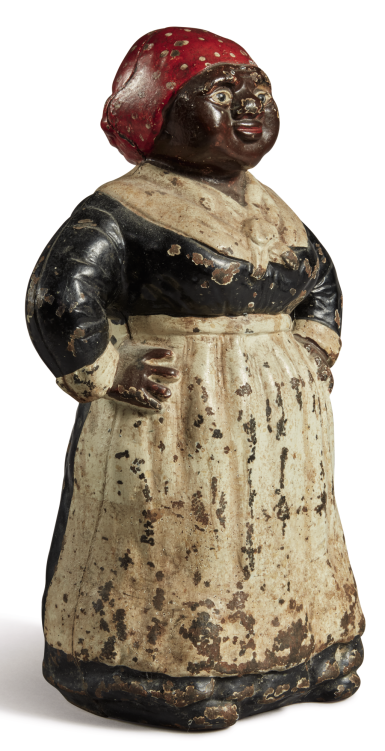 View full screen - View 1 of Lot 1056. PAINTED CAST-IRON AFRICAN-AMERICAN "MAMMY" DOORSTOP, HUBLEY CO., LANCASTER, PENNSYLVANIA, CIRCA 1920.