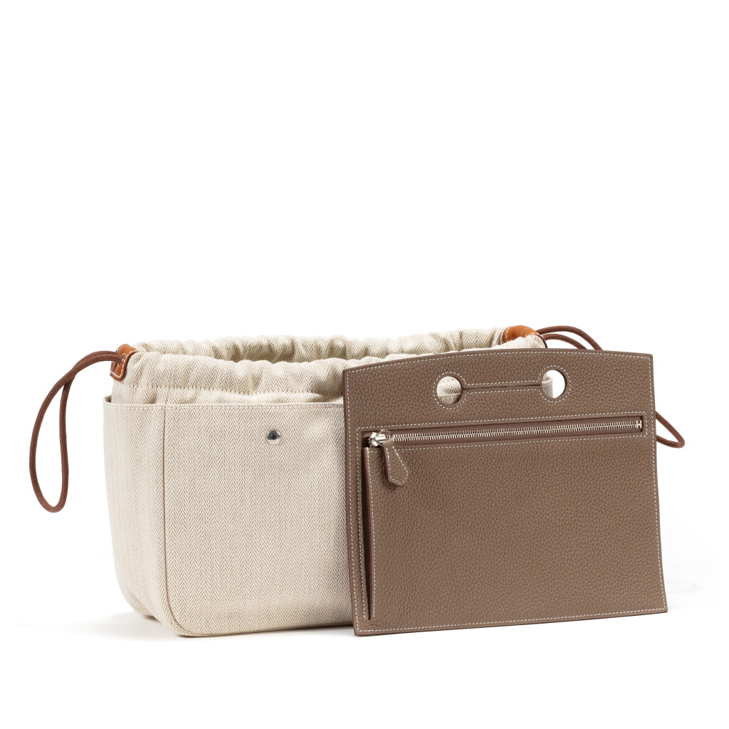 View full screen - View 1 of Lot 519. Etoupe Togo BackPocket Birkin 25, 2021 and Fourbi 25 Pouch, 2022.