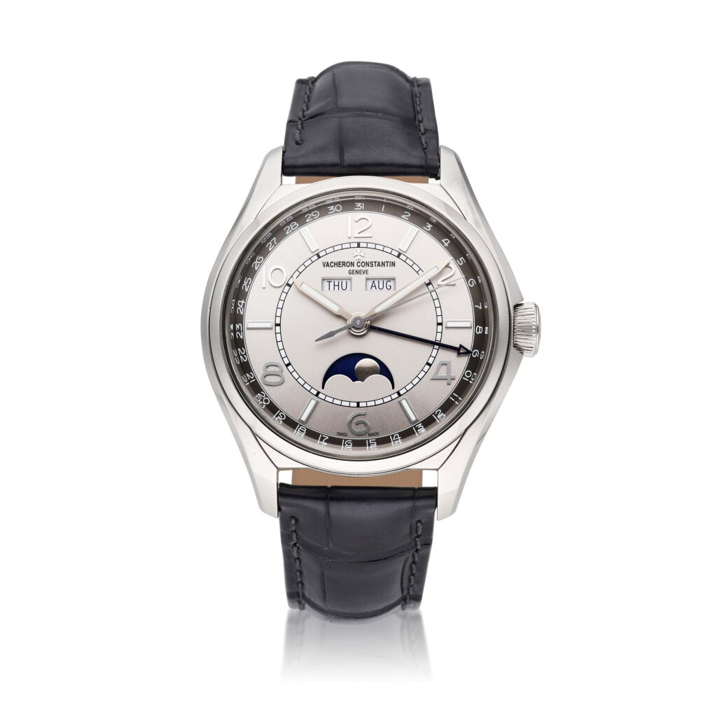 View full screen - View 1 of Lot 78. Reference 4000E/000A-B439 X40A2017 FiftySix | A stainless steel triple calendar wristwatch with moon phase, Circa 2020.