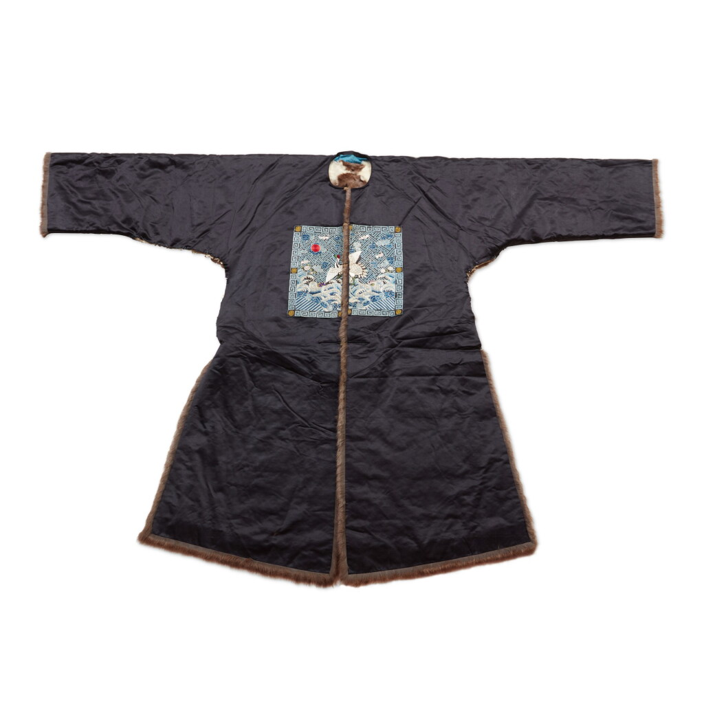 View full screen - View 1 of Lot 237. A fur-lined navy silk first-rank civil official winter robe, Late Qing dynasty | 清末 石青色綢內襯皮一品補服.