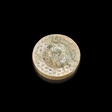 View full screen - View 1 of Lot 3058. A calcified celadon jade sword pommel, Han dynasty 漢 青玉劍首.