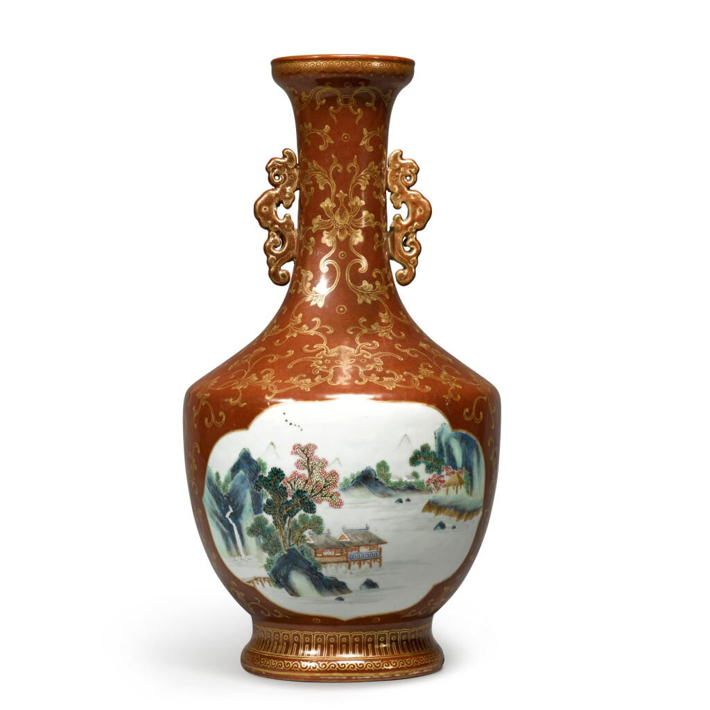 View full screen - View 1 of Lot 1037. An iron-red-ground gilt-decorated and famille-rose 'landscape' vase, Late Qing dynasty / Republic period | 清末 / 民國 礬紅地描金開光粉彩山水圖龍耳瓶 《大清乾隆年製》仿款.