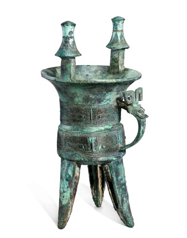 View full screen - View 1 of Lot 5110. A large and exceptional bronze ritual wine vessel, jia, Mid Shang dynasty | 商中期 青銅饕餮連珠紋斝.