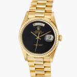 Day-Date, Reference 18238 | A yellow gold wristwatch with day, date, bracelet and onyx hardstone dial | Circa 1991
