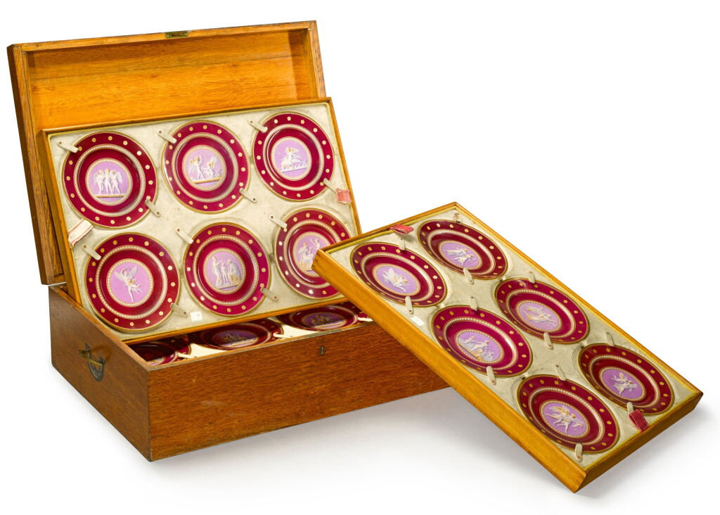 View full screen - View 1 of Lot 105. A Royal presentation set of eighteen Royal Copenhagen claret-ground plates, circa 1858.