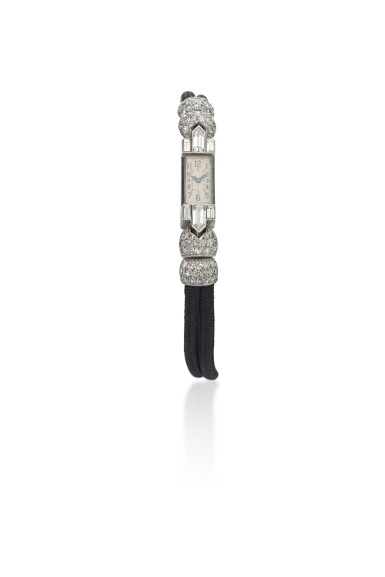 View full screen - View 1 of Lot 805. Platinum, gold, enamel and diamond wristwatch, circa 1920.