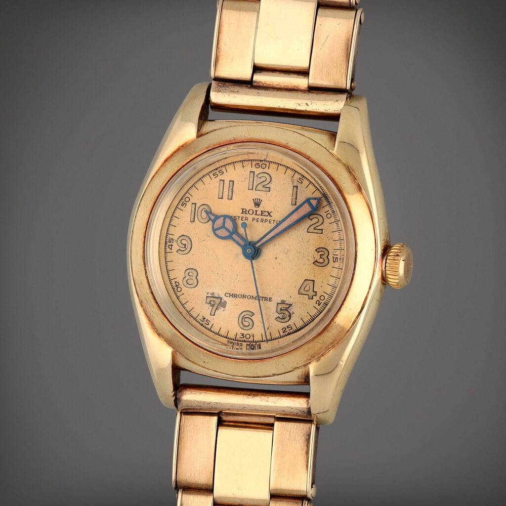 View full screen - View 1 of Lot 309. 'Bubbleback', Reference 3131 | A yellow gold wristwatch with bracelet | Circa 1946.