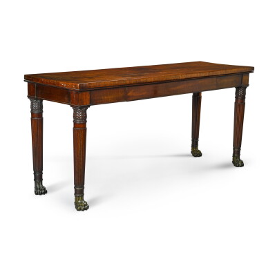 View full screen - View 1 of Lot 37. A George IV brass-mounted carved mahogany side table, circa 1825, in the manner of Gillows.