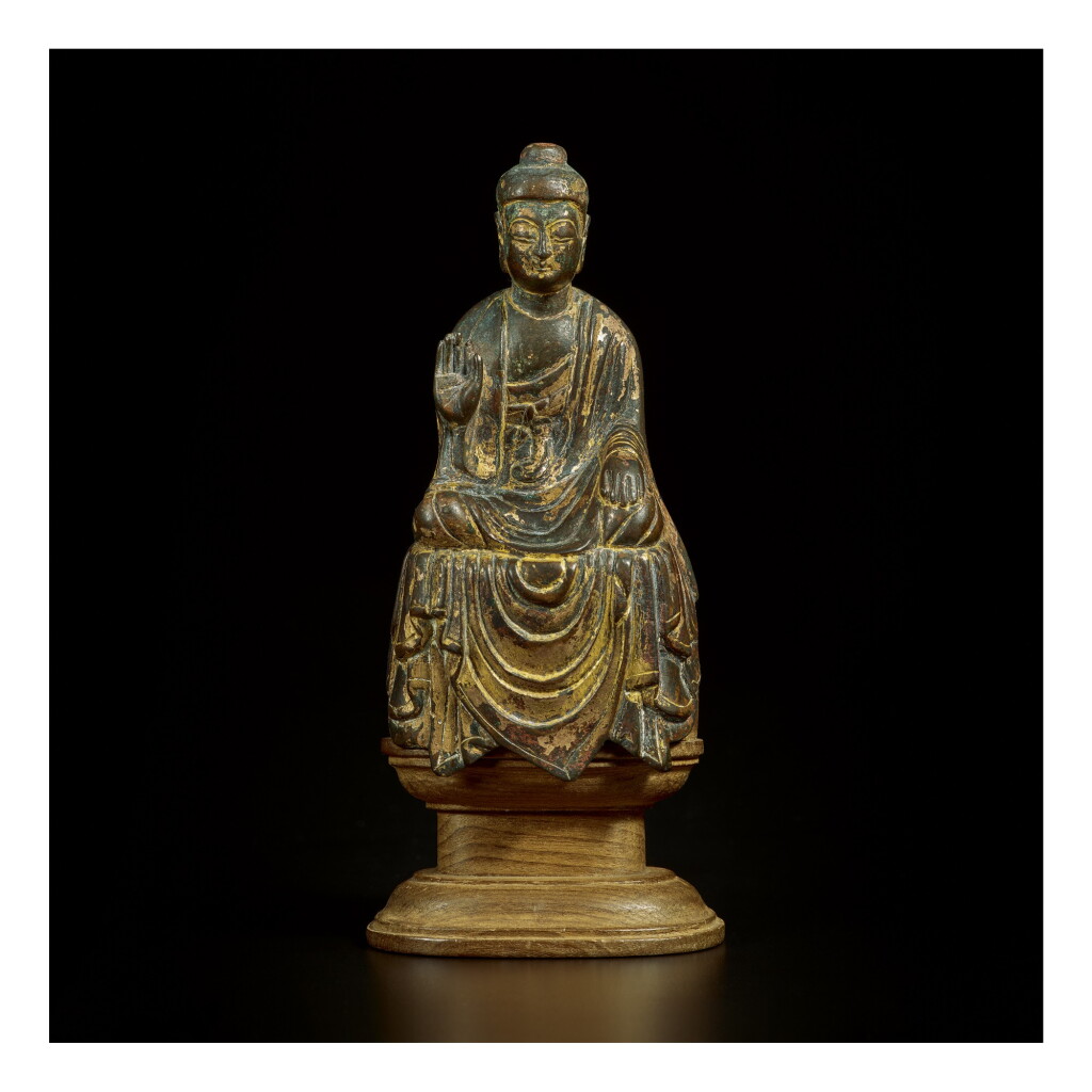 View full screen - View 1 of Lot 592. A GILT-BRONZE FIGURE OF MAITREYA, TANG DYNASTY.