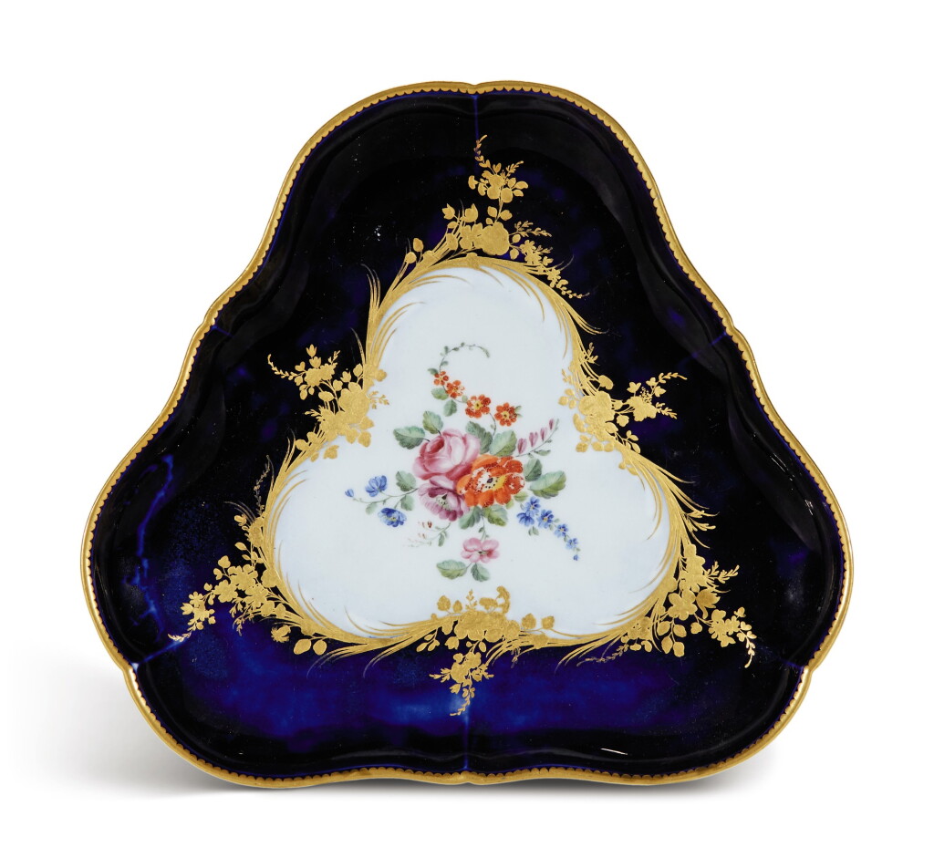 View full screen - View 1 of Lot 92. A VINCENNES PORCELAIN BLEU LAPIS TRIANGULAR TRAY, CIRCA 1755.