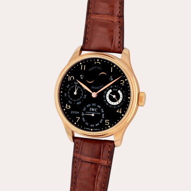 View full screen - View 1 of Lot 272. Portugieser, Reference 502103 | A pink gold perpetual calendar wristwatch with Northern and Southern hemisphere moon phases, power reserve and year indication | Circa 2004.