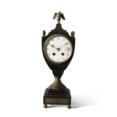 View full screen - View 1 of Lot 14. An Ebonized Wood and Brass Mounted 'Shield-Form' Mantel Clock, Lorenz Furtwangler & Sonne, Germany, Circa 1900.