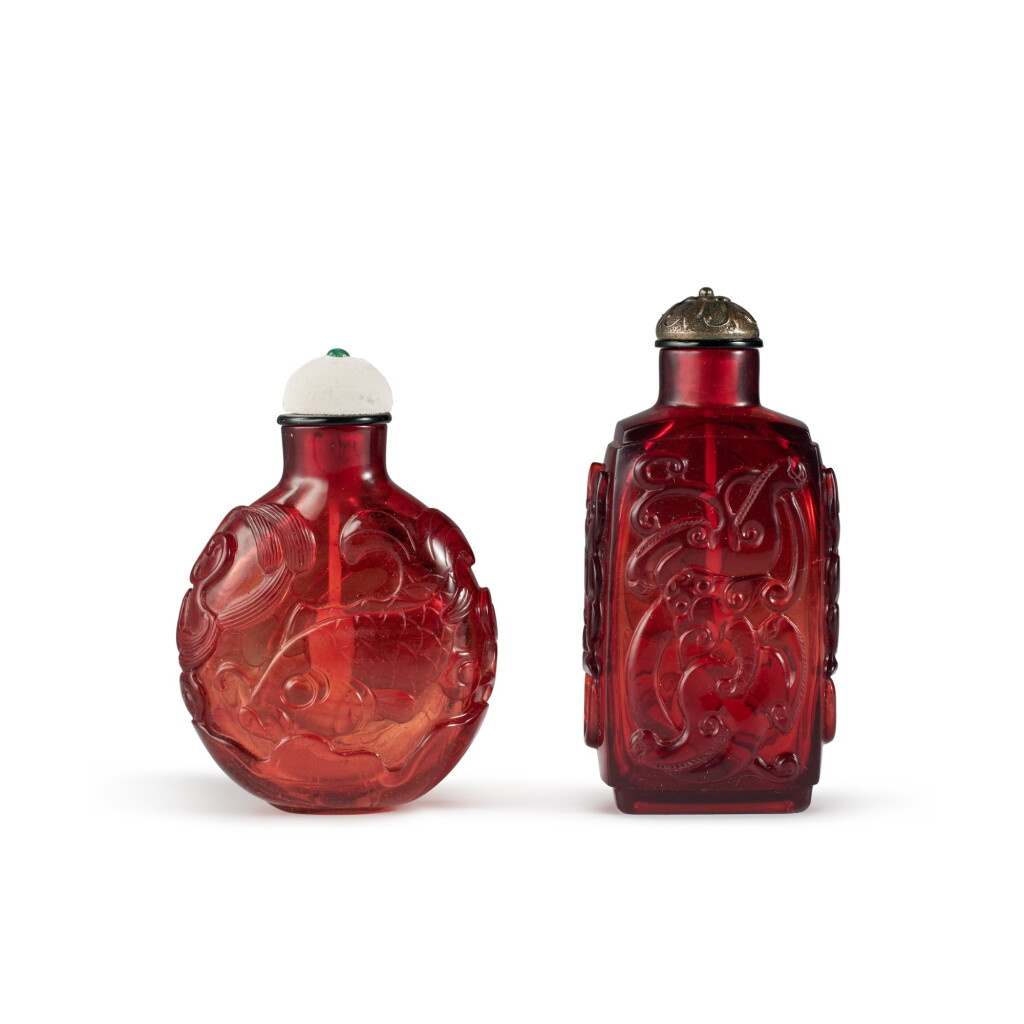 View full screen - View 1 of Lot 583. Two red glass snuff bottles, Qing dynasty, 18th / 19th century | 清十八 / 十九世紀 紅料鼻煙壺一組兩件.