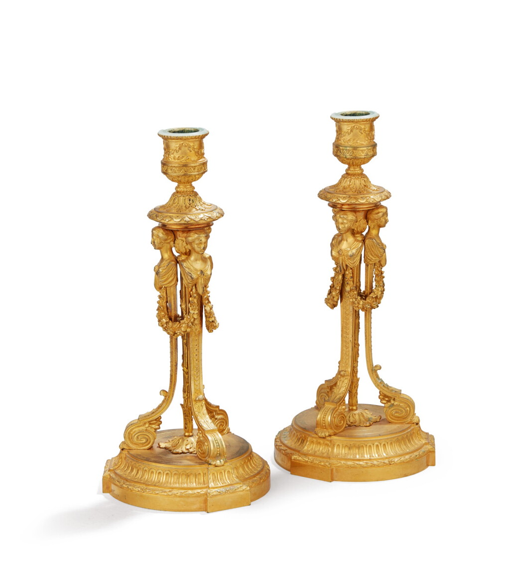 View full screen - View 1 of Lot 198. A PAIR OF LOUIS XVI GILT-BRONZE CANDLESTICKS AFTER A MODEL BY JEAN-FRANÇOIS FORTY | PAIRE DE FLAMBEAUX EN BRONZE DORÉ D'ÉPOQUE LOUIS XVI D'APRÈS UN MODÈLE DE JEAN-FRANÇOIS FORTY.