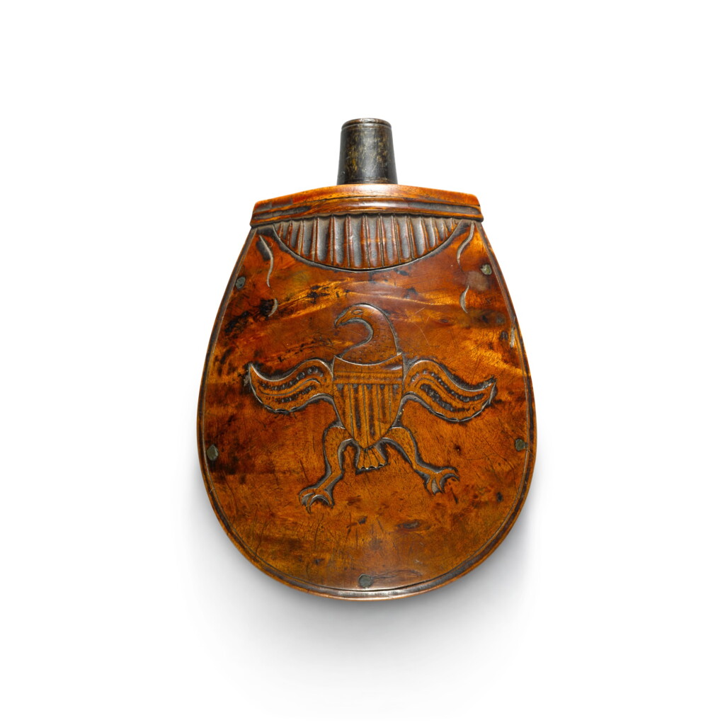 View full screen - View 1 of Lot 380. Fine Carved and Figured Maple Powder Flask, Pennsylvania, Circa 1800.