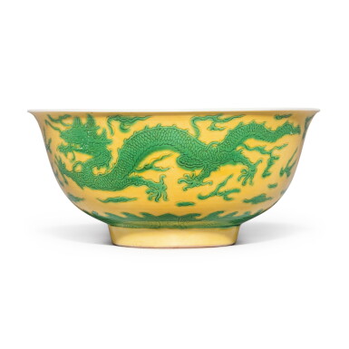 View full screen - View 1 of Lot 1187. A yellow-ground green-enameled 'dragon' bowl, Mark and period of Kangxi | 清康熙 黃地綠彩趕珠龍紋盌 《大清康熙年製》款.
