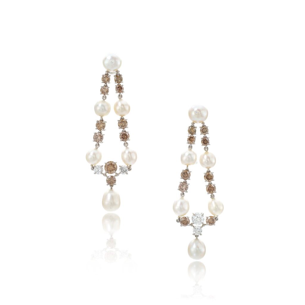 View full screen - View 1 of Lot 977. Pair of natural pearl and diamond pendent earrings.