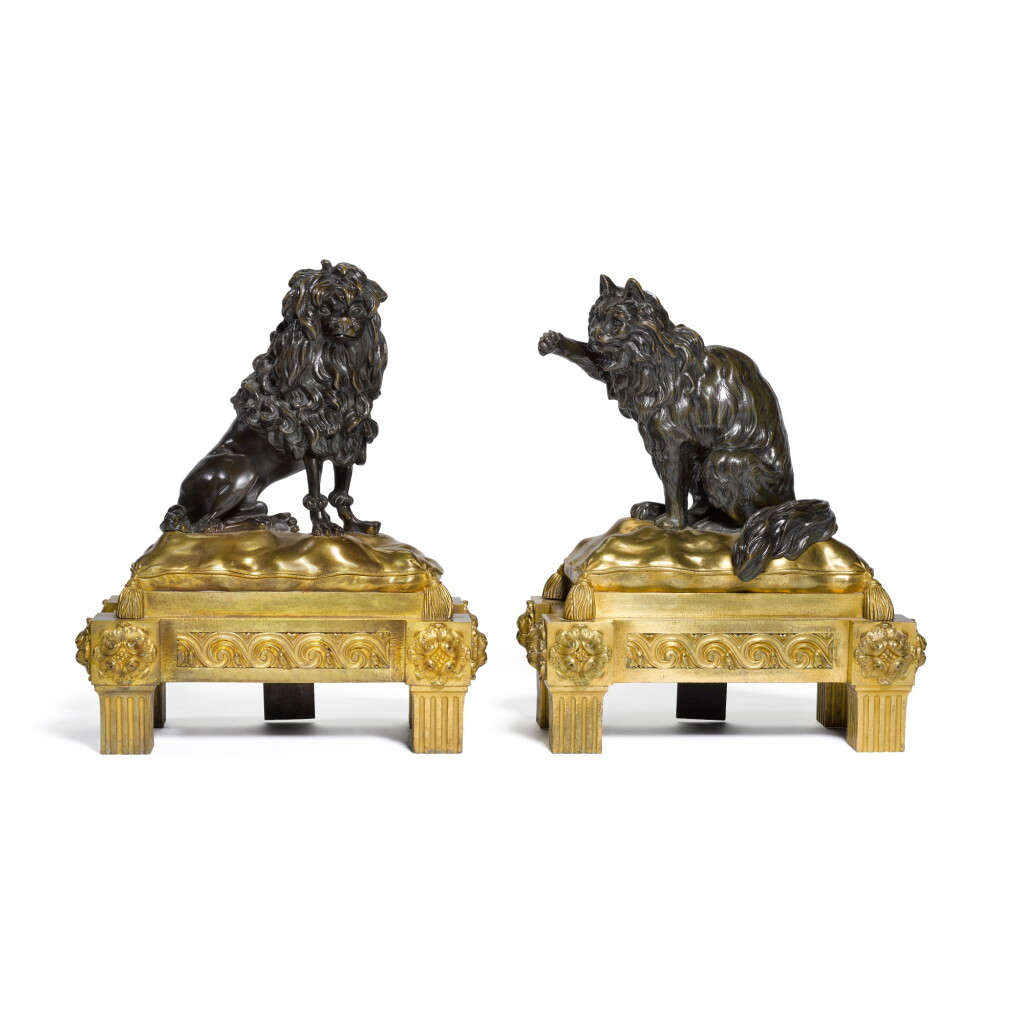 View full screen - View 1 of Lot 28. A pair of Louis XVI gilt and patinated bronze chenets, late 18th century, in the manner of Philippe Caffieri.