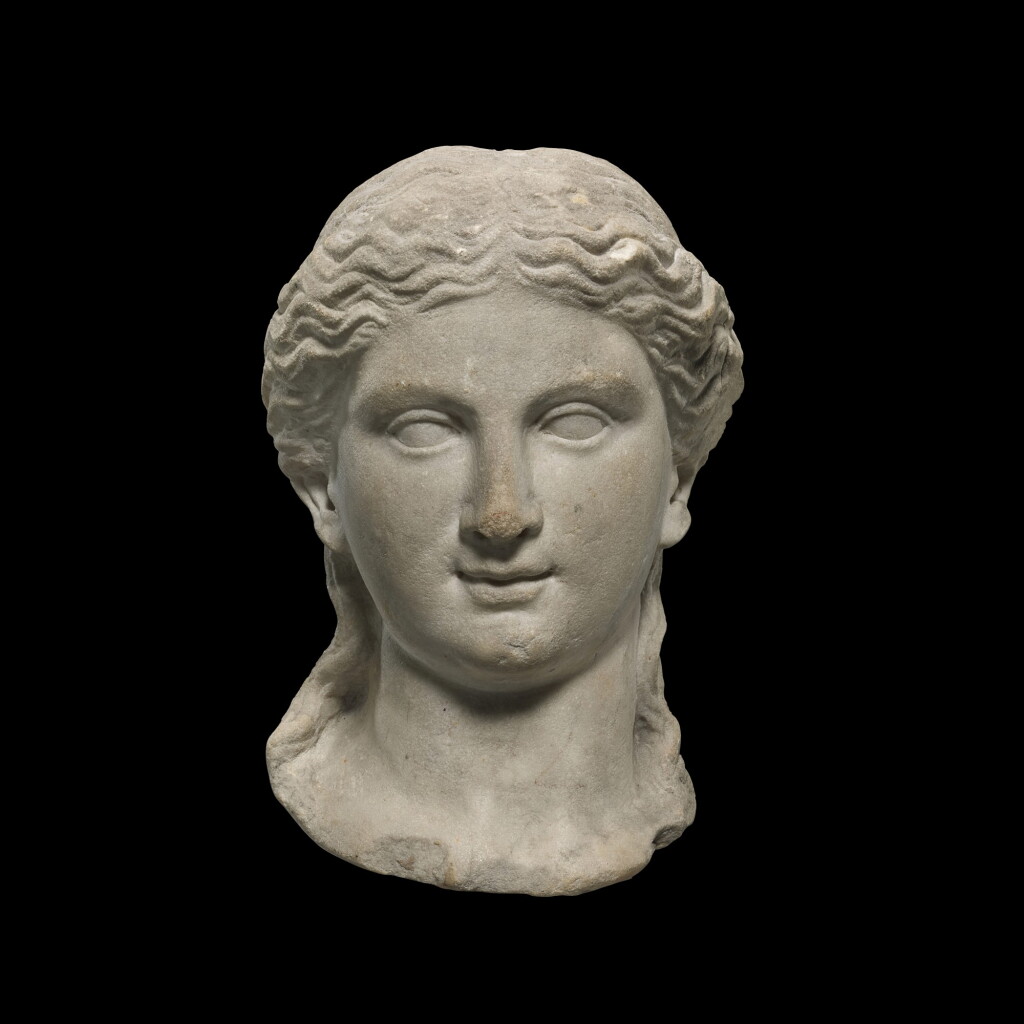 View full screen - View 1 of Lot 45. A ROMAN MARBLE HEAD OF A WOMAN, CIRCA EARLY 1ST CENTURY A.D..
