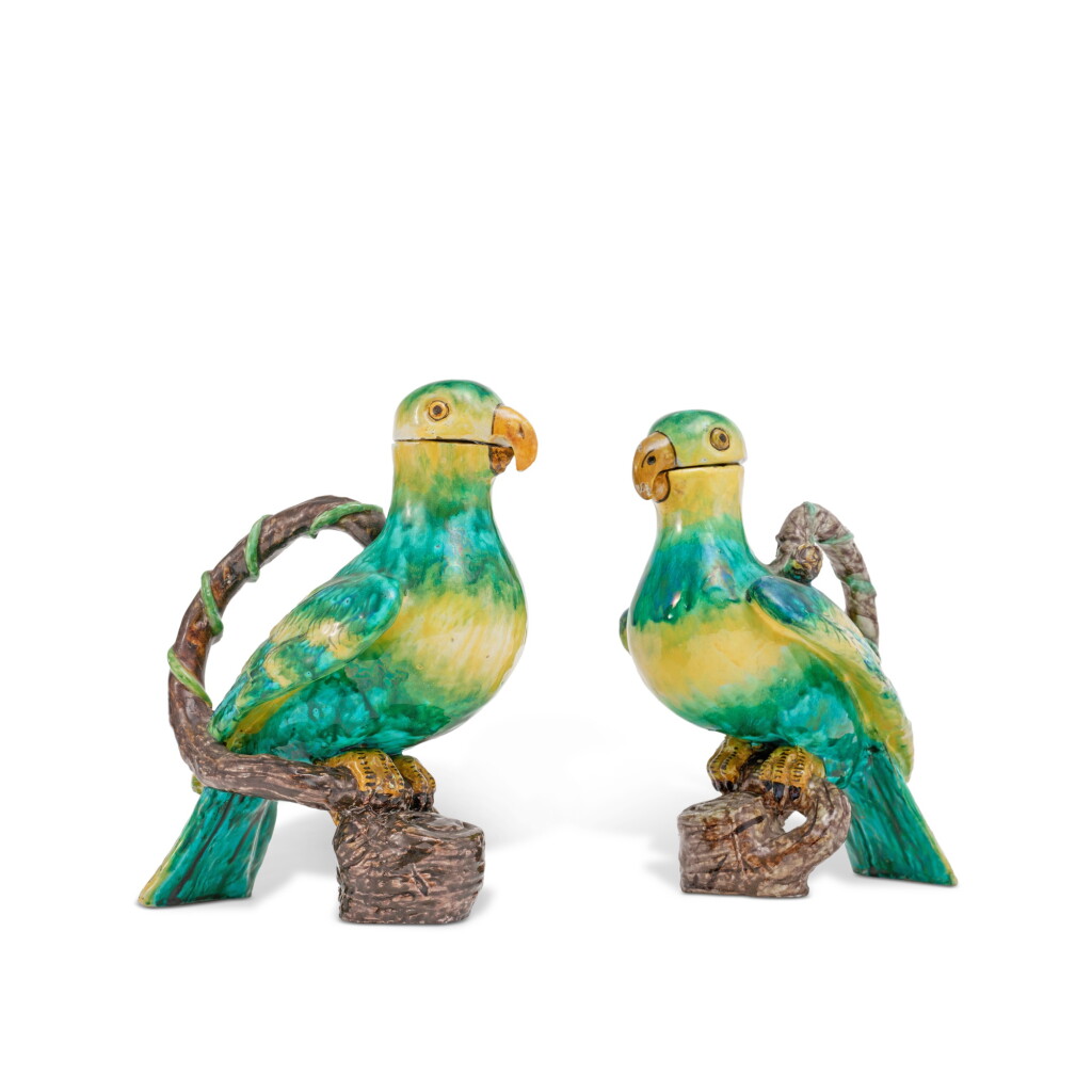 View full screen - View 1 of Lot 68. A Pair of Proskau or Glienitz Faience Parrot-Form Jugs and Covers, Circa 1770.