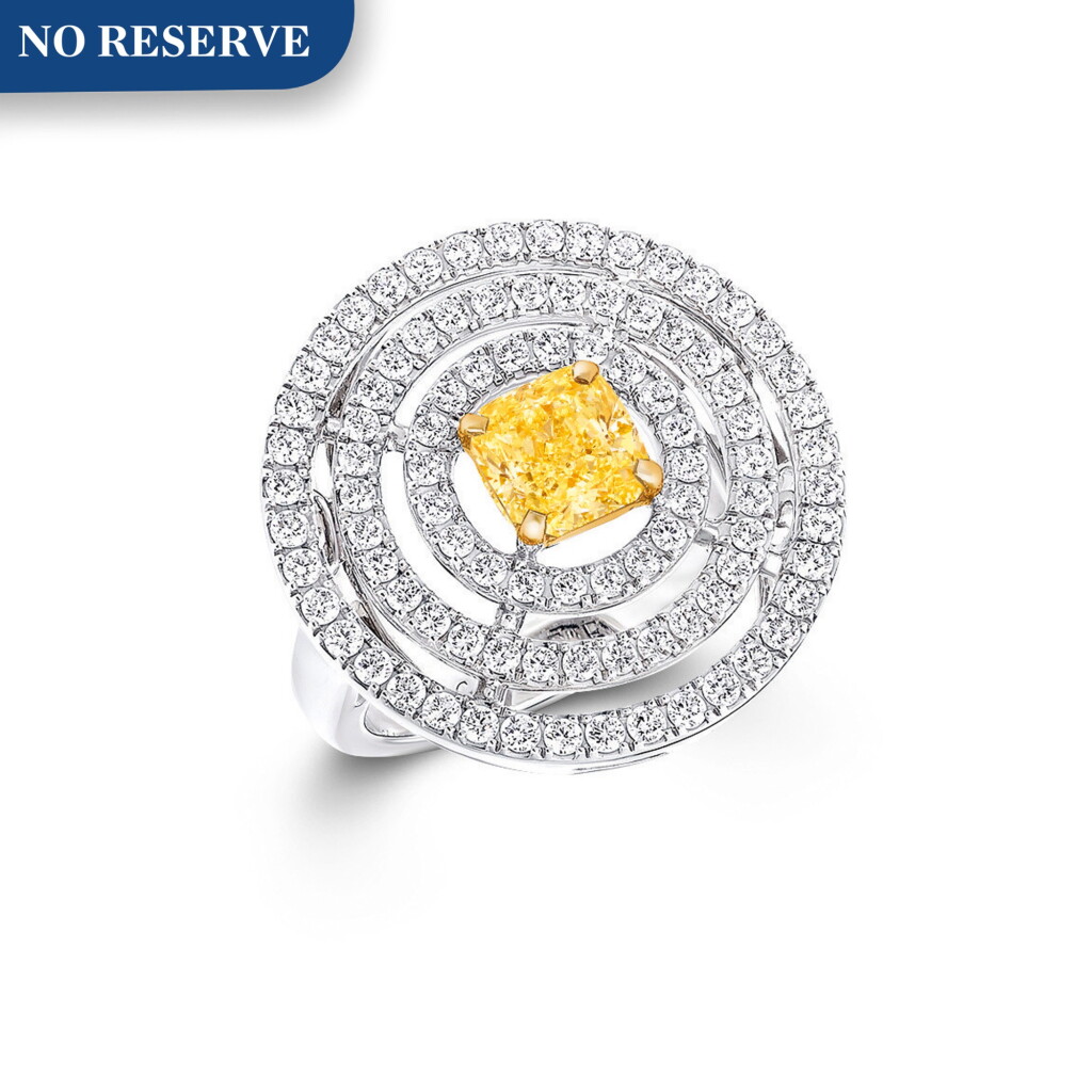 View full screen - View 1 of Lot 24. GRAFF | DIAMOND AND FANCY YELLOW DIAMOND 'BULLSEYE' RING 格拉夫 | 鑽石配彩黃色鑽石「Bullseye」戒指.