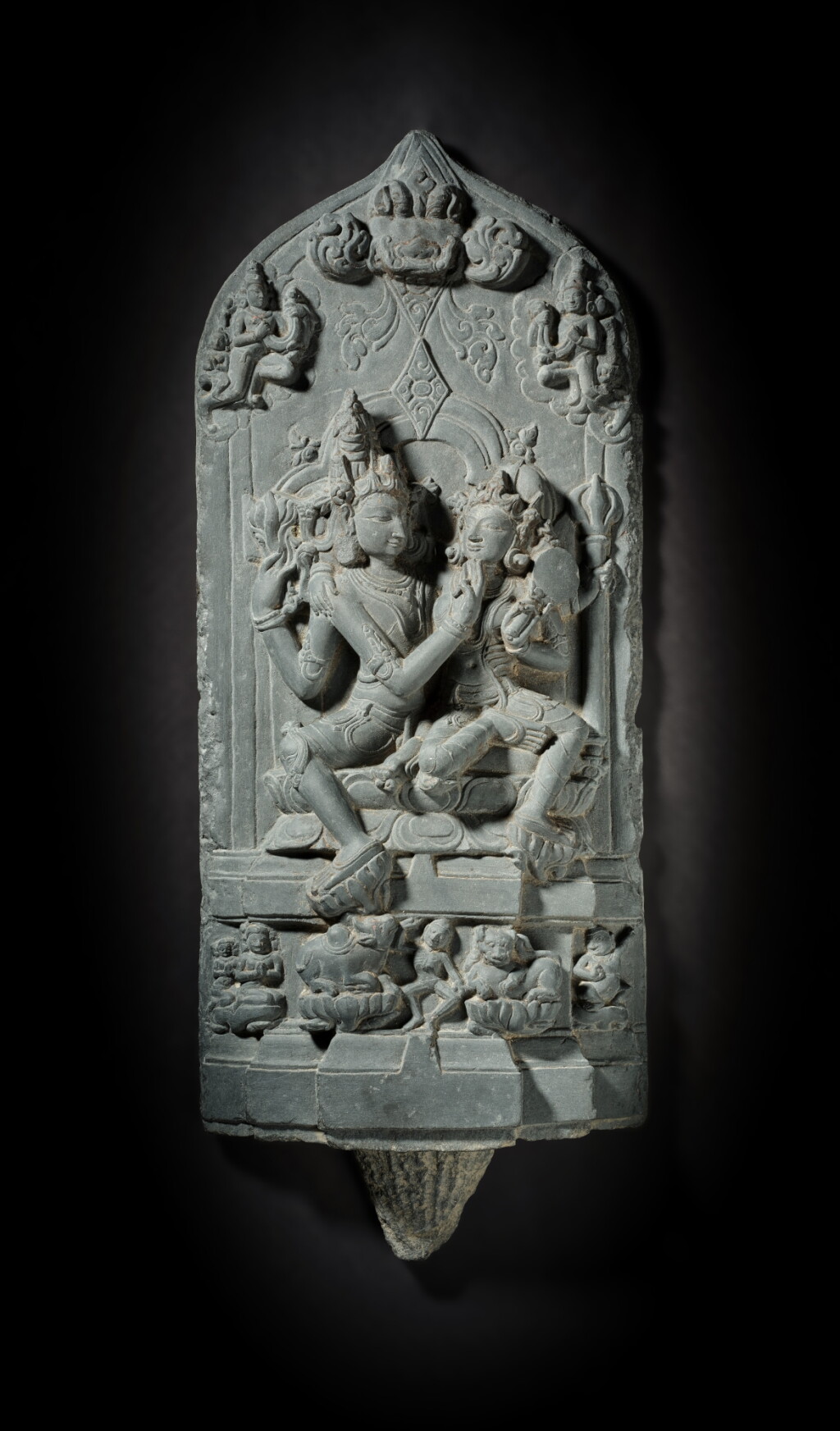 View full screen - View 1 of Lot 162. A black stone stele figure depicting Uma-Maheshvara, East India, Pala period, 12th century.