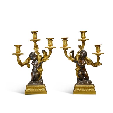 View full screen - View 1 of Lot 155. A Pair of French Gilt and Patinated Bronze Three-Light Candelabra, First Half 19th Century.