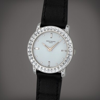 View full screen - View 1 of Lot 234. Reference 5027 | A platinum and diamond-set wristwatch | Circa 1995.