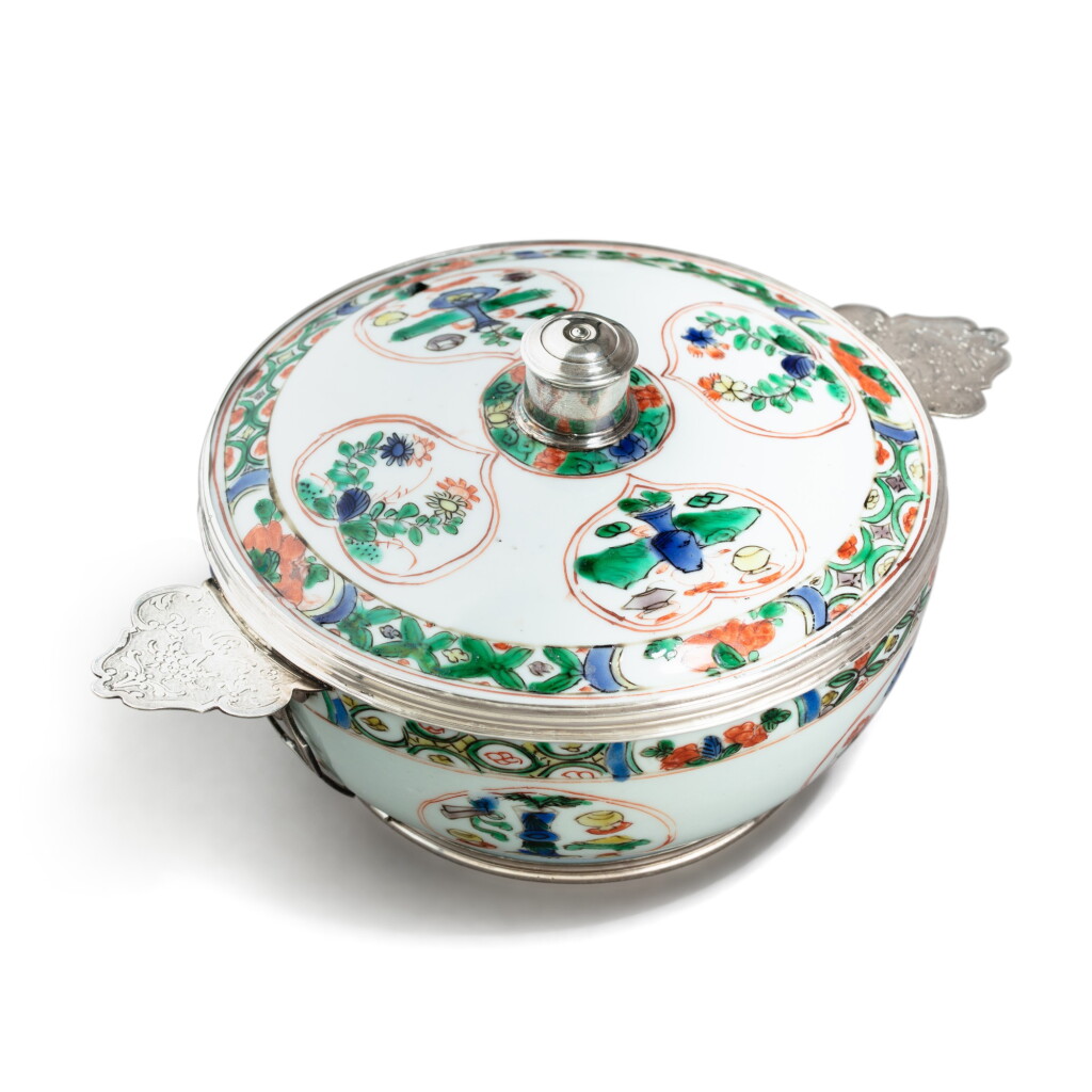 View full screen - View 1 of Lot 808. A famille verte porcelain ecuelle and cover with French silver mounts, the porcelain late 17th century, the silver Paris, 1717-1722.
