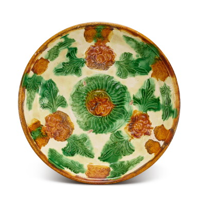 View full screen - View 1 of Lot 315. A moulded sancai 'floral' dish, Liao dynasty 遼 三彩印花盤.