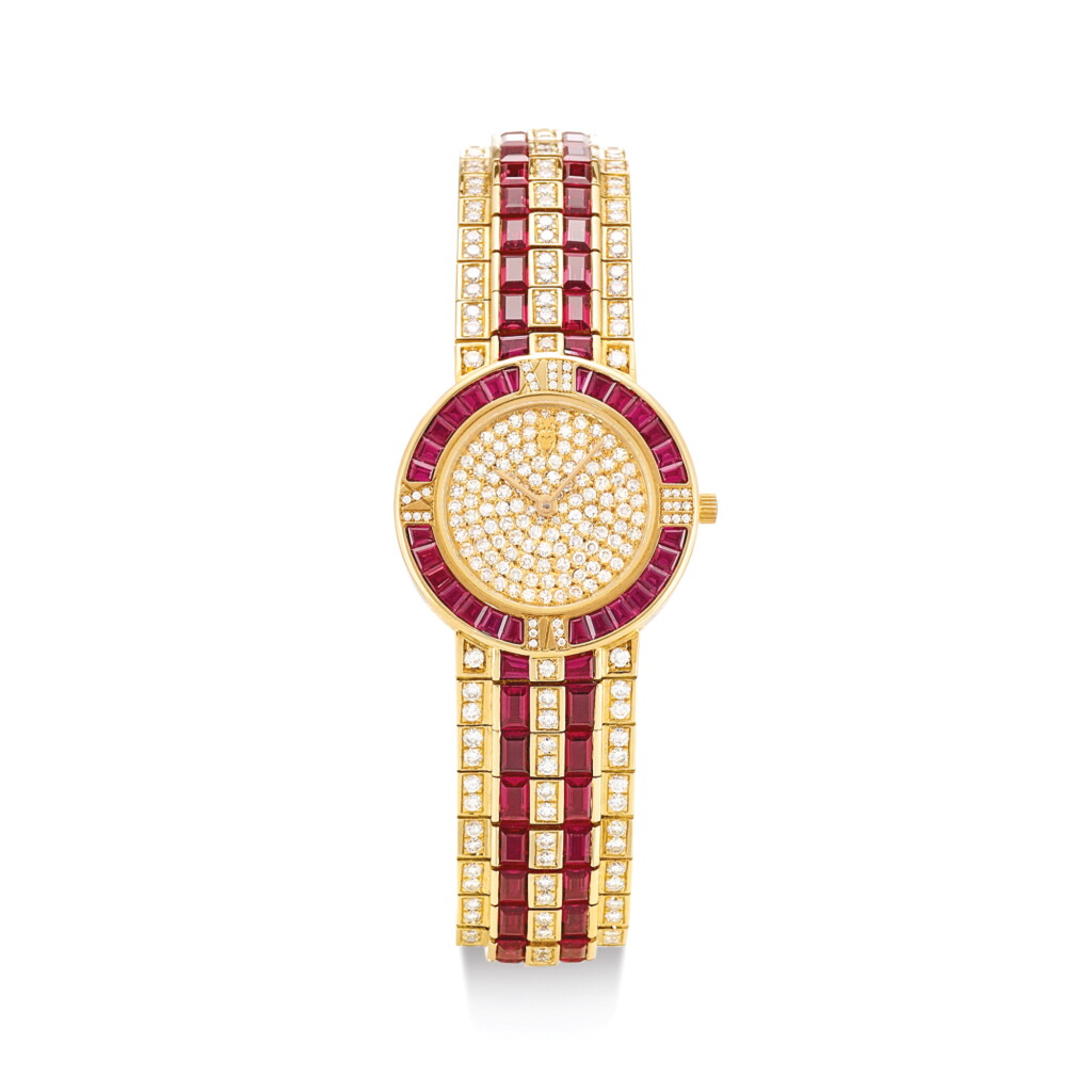 View full screen - View 1 of Lot 2123. CORUM | REFERENCE 30 42265V133 A YELLOW GOLD, DIAMOND AND RUBY-SET BRACELET WATCH, CIRCA 1990" | 崑崙 | 型號 30 42265V133 黃金鑲鑽石及紅寶石鏈帶腕錶,錶殼編號461834,約1990年製".