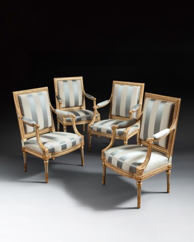 View full screen - View 1 of Lot 46. A set of six Louis XVI gilt and white painted beechwood fauteuils 'à dossier plat', circa 1780, stamped by Pierre Brizard.
