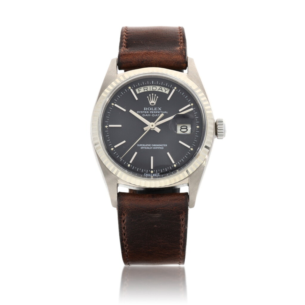 View full screen - View 1 of Lot 8030. Rolex | Day-Date, Reference 1803, A white gold wristwatch with day and date, Circa 1970 | 勞力士 | Day-Date 型號1803 白金腕錶,備日期及星期顯示,約1970年製.