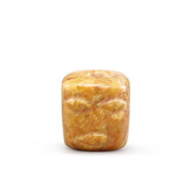 View full screen - View 1 of Lot 230. An archaic carved stone 'humanoid' bead, Neolithic period, Dawenkou Culture | 新石器時代大汶口文化 石雕人面紋勒子.