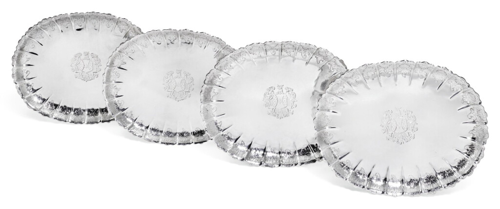 View full screen - View 1 of Lot 118. A SET OF FOUR GEORGE II SILVER STRAWBERRY DISHES, JOHN BARBE, LONDON, 1737.