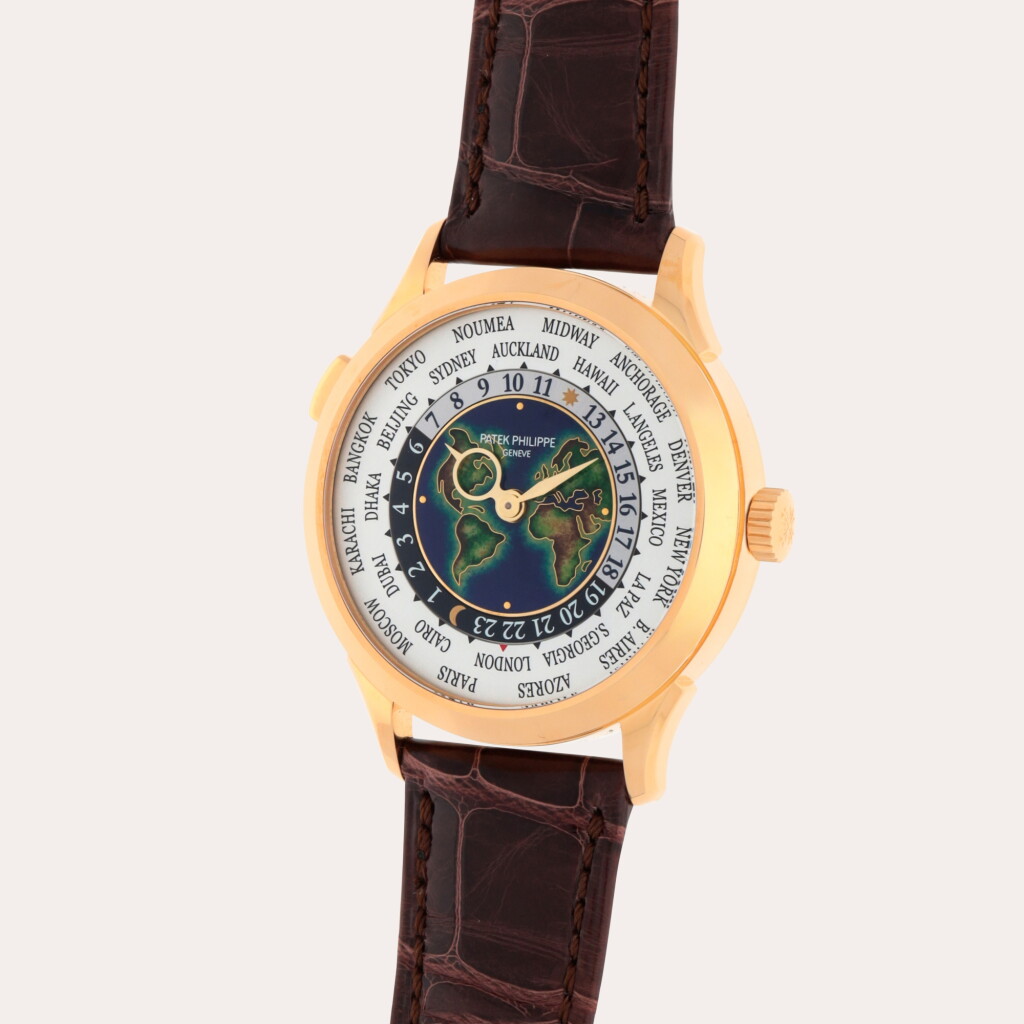 View full screen - View 1 of Lot 38. World Time, Reference 5231J-001 | A yellow gold world time wristwatch with a cloisonné enamel dial depicting Europe, Africa and the Americas | Circa 2019.