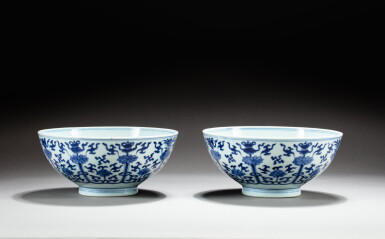 View full screen - View 1 of Lot 187. A pair of blue and white 'bajixiang' bowls, Qing dynasty, Kangxi period | 清康熙 青花纏枝番蓮托八吉祥紋大盌一對 .