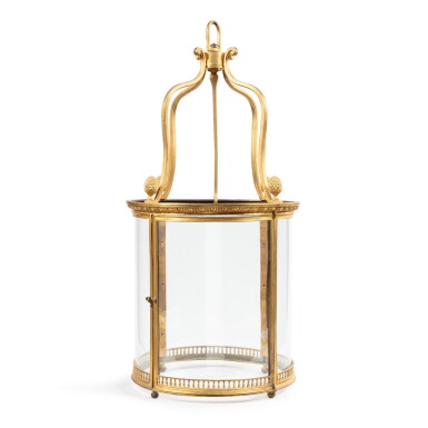 View full screen - View 1 of Lot 1000. A Louis XVI style gilt-bronze and glass lantern | Lanterne en bronze doré et verre de style Louis XVI.