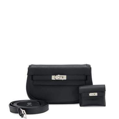 View full screen - View 1 of Lot 184. Black Swift Kelly Moove Bag Palladium Hardware, 2025.